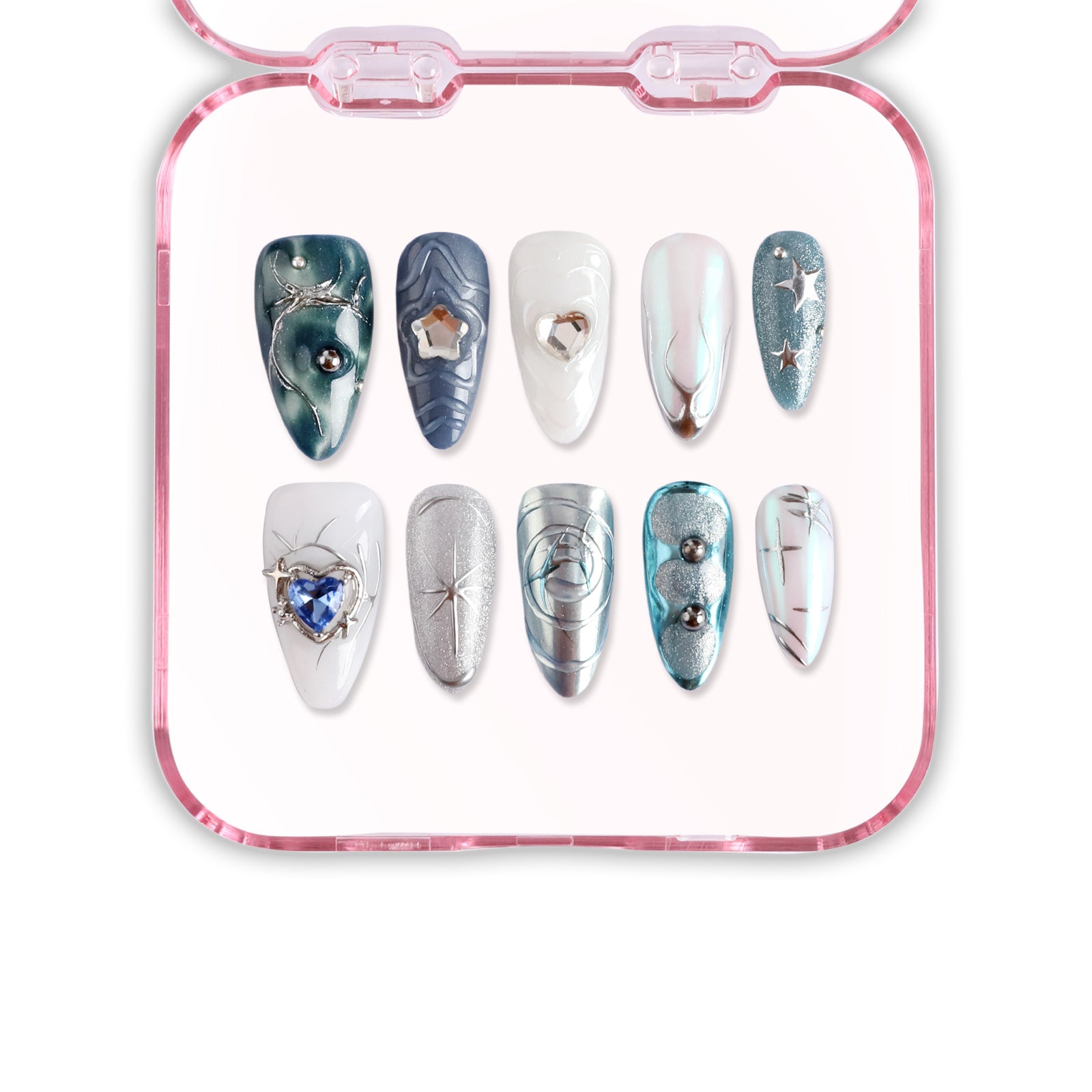 Set of decorative nail art sheets with various designs on a pink tray.